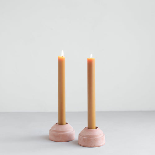 Ribbed taper candles and Bergs Potter terracotta taper holders