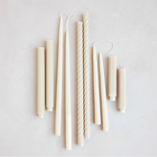 Our Parchment Taper Set combines all of our parchment-hued taper candles into the perfect bundle. Display the sizes and shapes together or separately. 12" dipped tapers paired with fluted and hexagon tapers