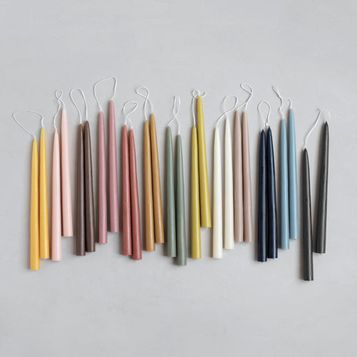Dippped taper candles in 13 nature inspired hues