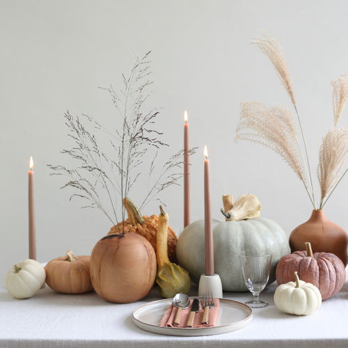 Dipped taper candles for dining room table decor. Colors are inspired by natural hues