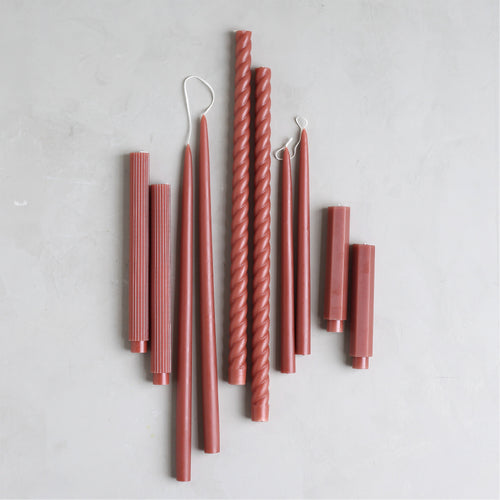Our Clay Taper Set combines all of our clay-hued taper candles into the perfect bundle. Display the sizes and shapes together or separately.   Set includes: one pair of moss 12" and one pair of moss 18" dipped taper candles. One pair of 18", one pair of 10" and one pair of 6" Fancy Taper Candles. 