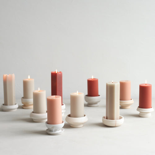 This ceramic pillar candle holder was thought up as the perfect pair to our 6" and 9" pillar candles. This dish is also ideal to pair with our flower pin frogs to create ikebana-inspired floral arrangements.