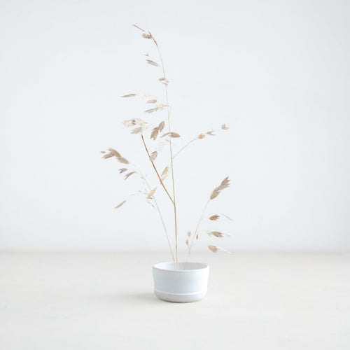 This vessel is perfectly crafted to be used with our Japanese ceramic pin frogs, flower frogs and metal pin frogs to create ikebana styled floral arrangements. 