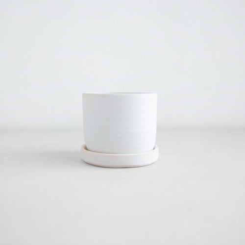 Designed in collaboration with Grandmont Street, by ceramicist Julia Finlayson in Evanston, Illinois. Julia's work focuses on minimal, yet expressive forms with unexpected glazes and textures. Each piece is unique and slight imperfections are a feature to be celebrated. 