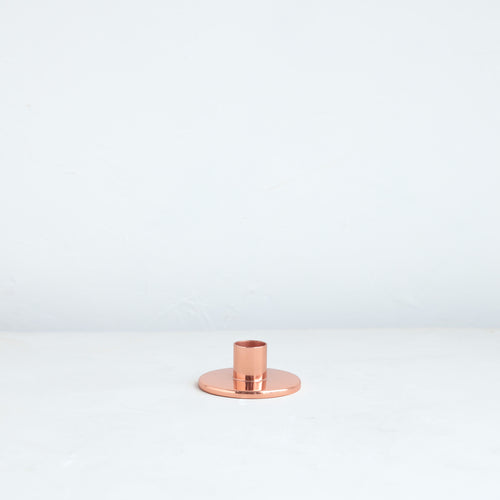 The perfect companion to our taper candle collection, our copper taper holders are a sleek, modern way to add a lustrous accent to any space. Each copper plated holder is sized to fit a standard taper candle.