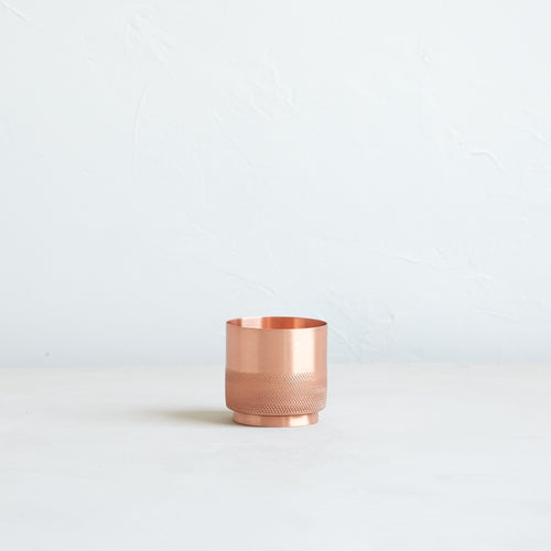 The match strike and holder is the perfect vessel to store matches at home. Strike matches on the textured exterior to easily light the match. Strike works with strike anywhere matches only. Matches not included. Handmade and solid copper. 