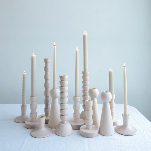 The Albert Candle Holder is hand turned in Lostine's small wood shop in Pennsylvania. This modern yet playful design is made from maple wood.  Each candle holder has a brass insert and pairs perfectly with our taper candles. Made in USA.