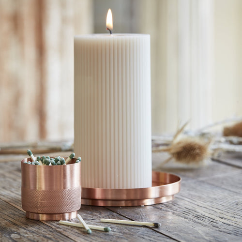 Our 3x6 ribbed pillar is a modern take on a traditional candle and embodies a superior depth of color, a cotton wick, and a 70-hour burn time.  Subtle variations in wax depth and color opacity may occur. Available in 4 custom colors: Parchment, Moss, Petal & Clay.  Dimensions: 3”W x 6”H