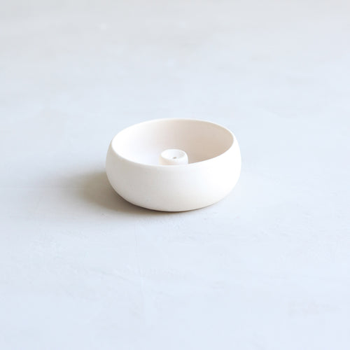 Designed in collaboration with Grandmont Street, by ceramicist Julia Finlayson in Evanston, Illinois. Julia's work focuses on minimal, yet expressive forms with unexpected glazes and textures. Each piece is unique and slight imperfections are a feature to be celebrated.  This unique, hand-crafted incense holder was thought up as the perfect pair to our essential oil incense sticks.
